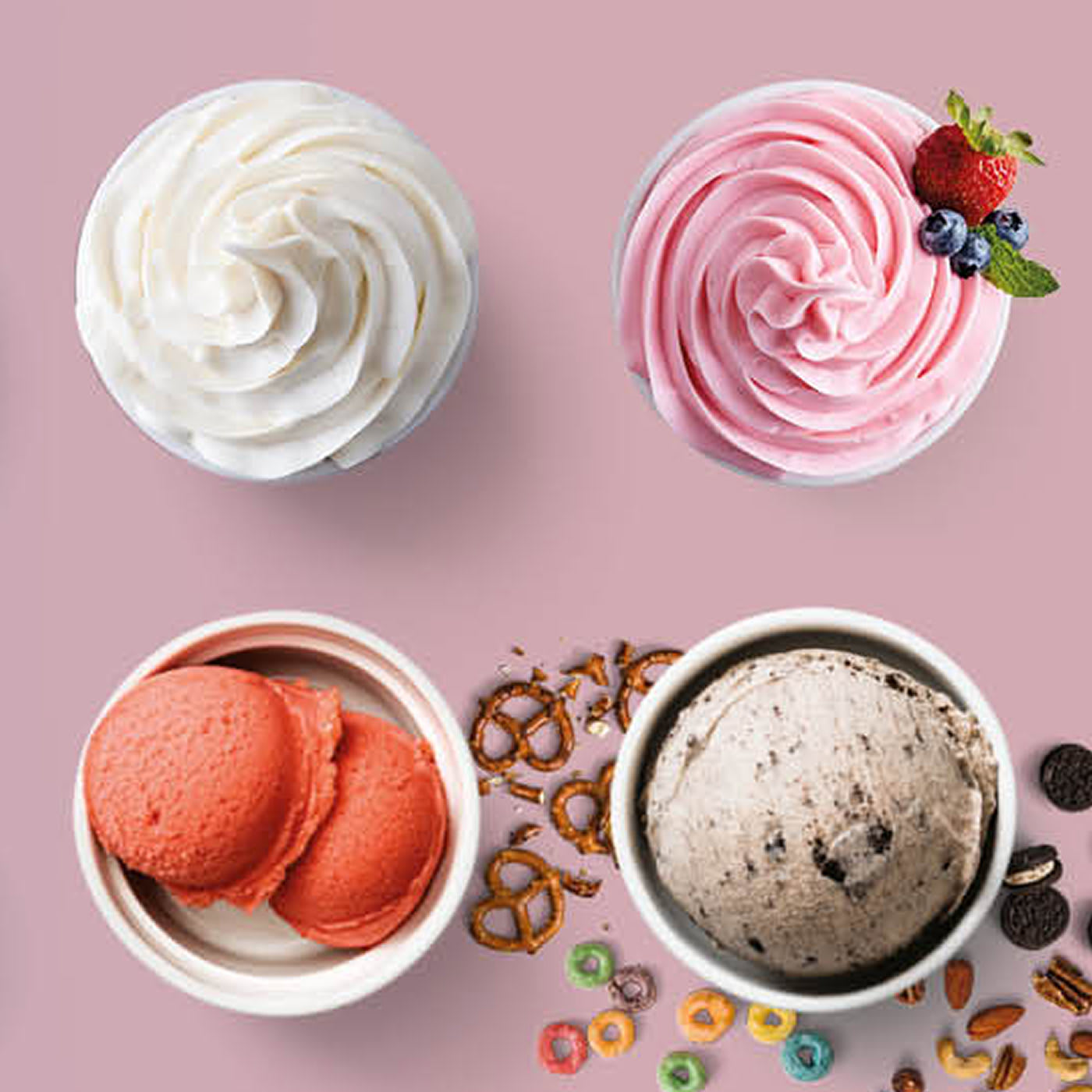 Four different frozen dessert bowls including whipped cream, berry swirl, ice cream with cookies, and sorbet with toppings.